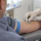 Man having blood drawn at a clinic for a testosterone blood test